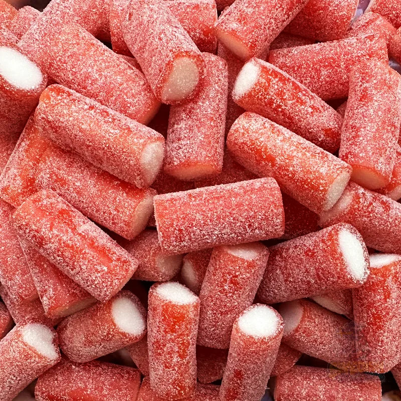 Close-up of red and white candy sticks with a sugary coating.