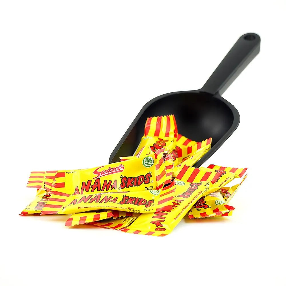 Banana Skids Display – showcasing a fun assortment of chewy banana-flavored Swedish candy with a soft, sweet texture.