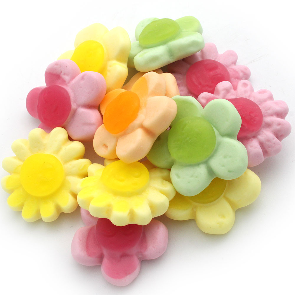 Front of the Happy Flowers packaging, featuring a vibrant selection of Swedish gummy candies in flower shapes.